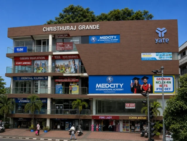 Exterior view of the Medcity International Academy Kottayam branch at Christhuraj Grande, offering study abroad counselling, German language courses, IELTS, OET, NCLEX-RN, PTE coaching, and overseas education services in Kerala.